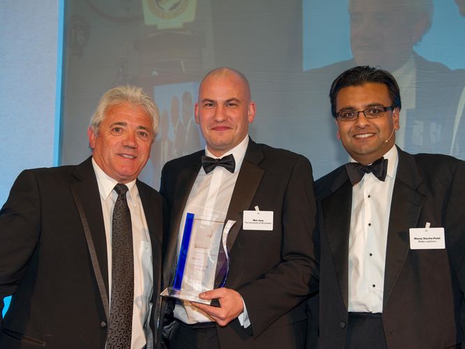 Mat Jane (middle) receiving his award from host Kevin Keegan (left) and Manoj Styche-Patel (right)